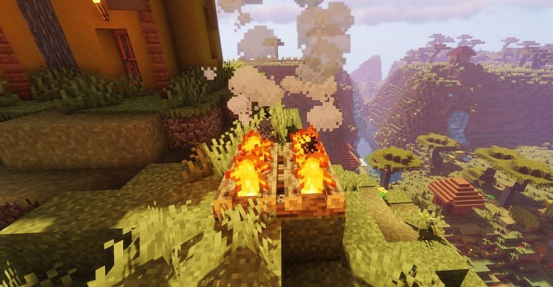  A beautiful shot of a campfire in a Savanna village in Minecraft (Image via Minecraft)
