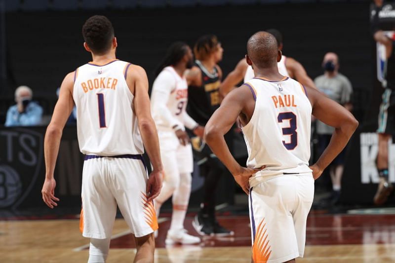 Chris Paul and Devin Booker of the Phoenix Suns