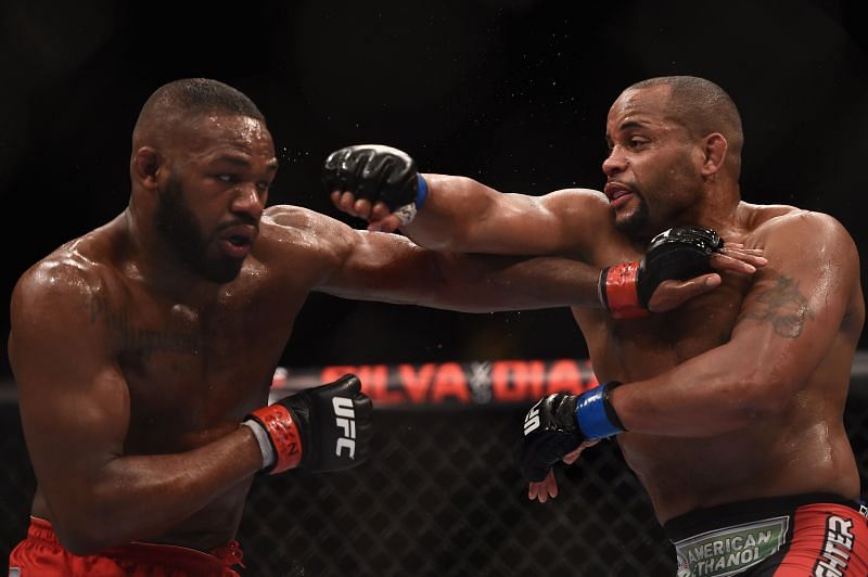 Jon Jones punches Daniel Cormier.