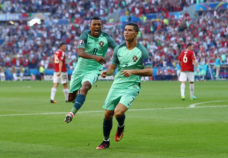 Cristiano Ronaldo and Nani celebrate a goal for Portugal