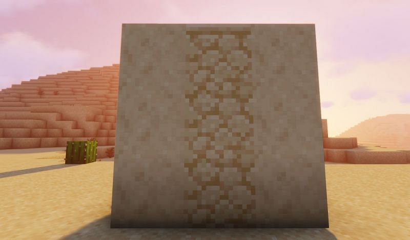 Shown: The difference between Sandstone (middle) and Smooth Sandstone (Image via Minecraft)