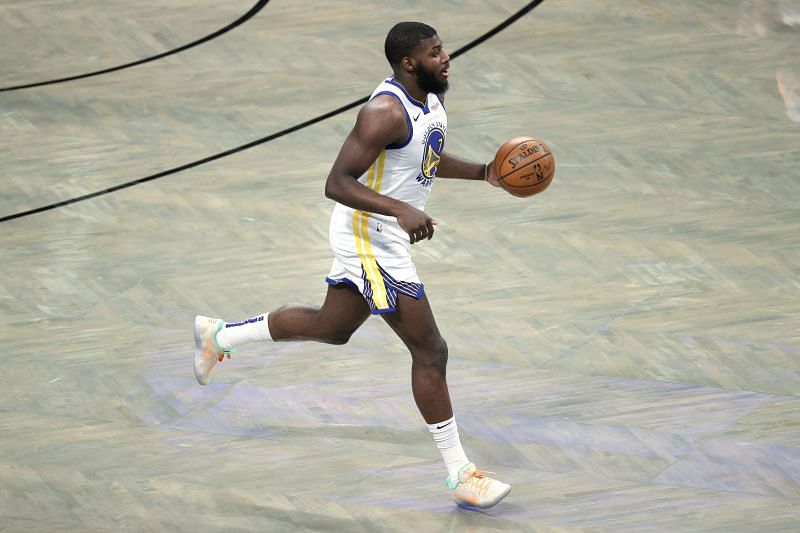 Eric Paschall #7 dribbles during the first half against the Brooklyn Nets 