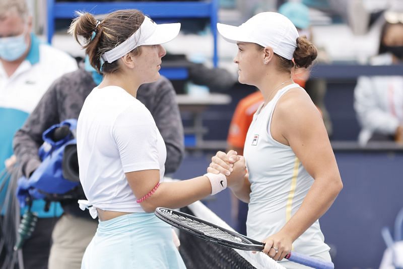 Bianca Andreescu (L) greets Ashleigh Barty greet each other after the final