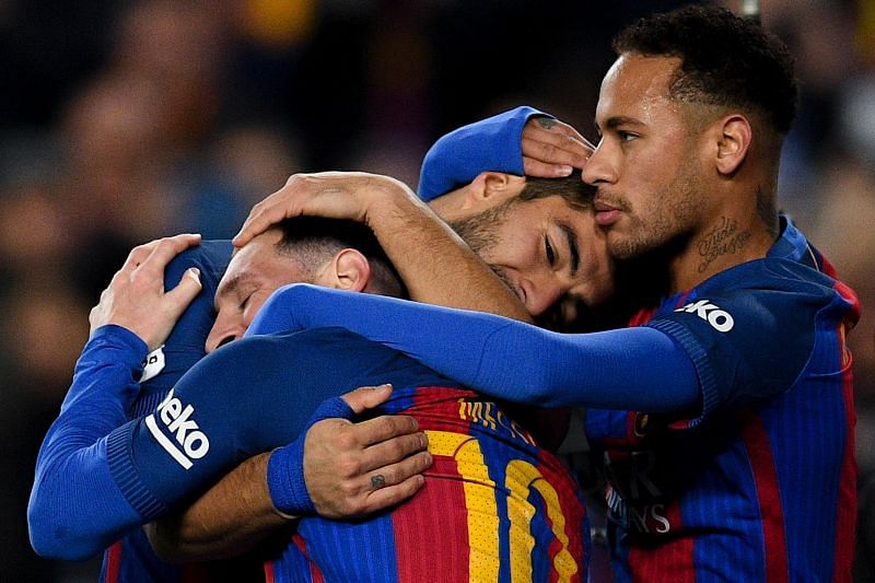 Lionel Messi, Luis Suarez and Neymar celebrate a goal