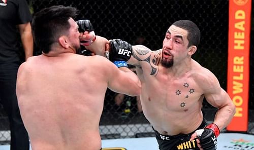 Kelvin Gastelum (left); Robert Whittaker (right)