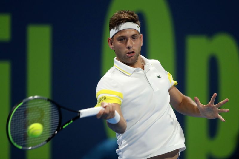 Filip Krajinovic hits a forehand