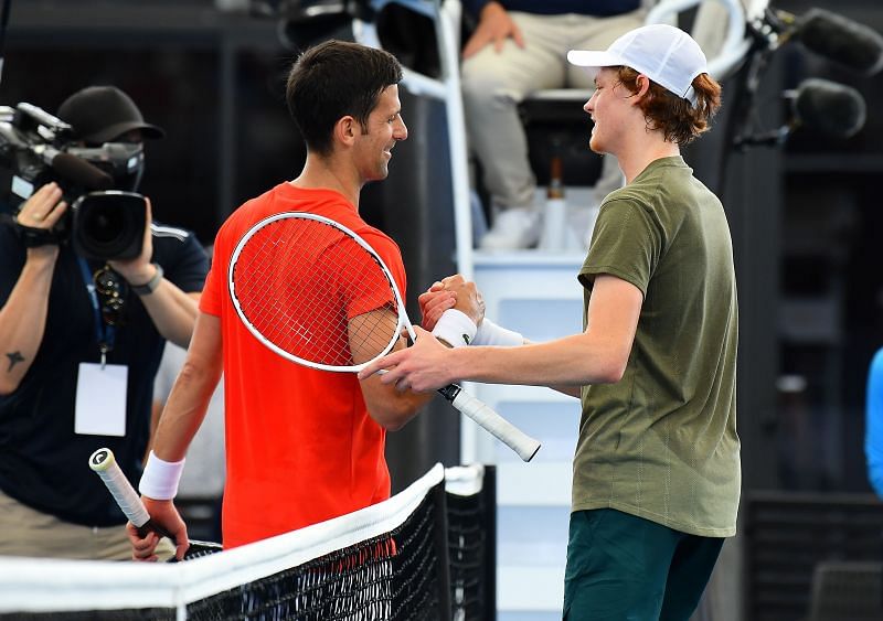 Novak Djokovic (L) and Jannik Sinner