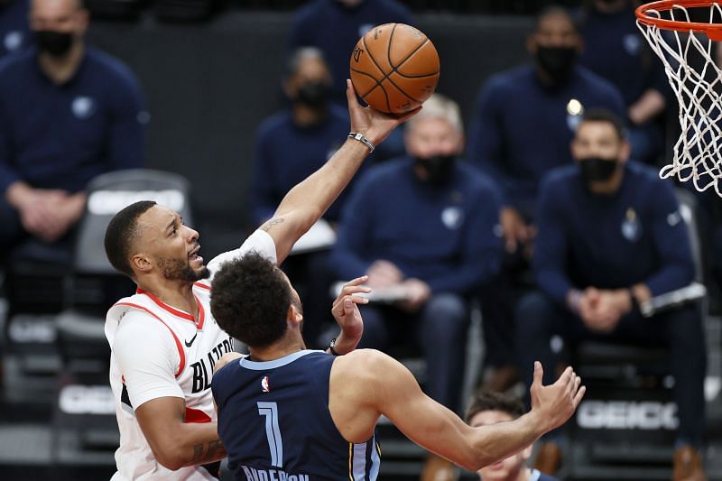 Norman Powell #24 shoots against Kyle Anderson #1