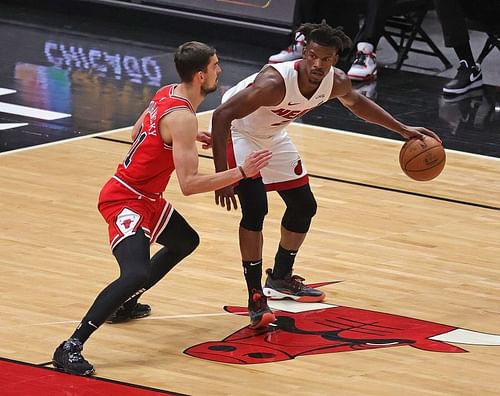 Jimmy Butler is guarded by Tomas Satoransky