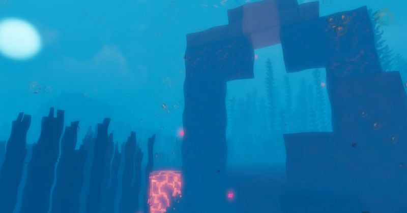  An underwater Ruined Portal, where God Apples can be found (Image via Minecraft)