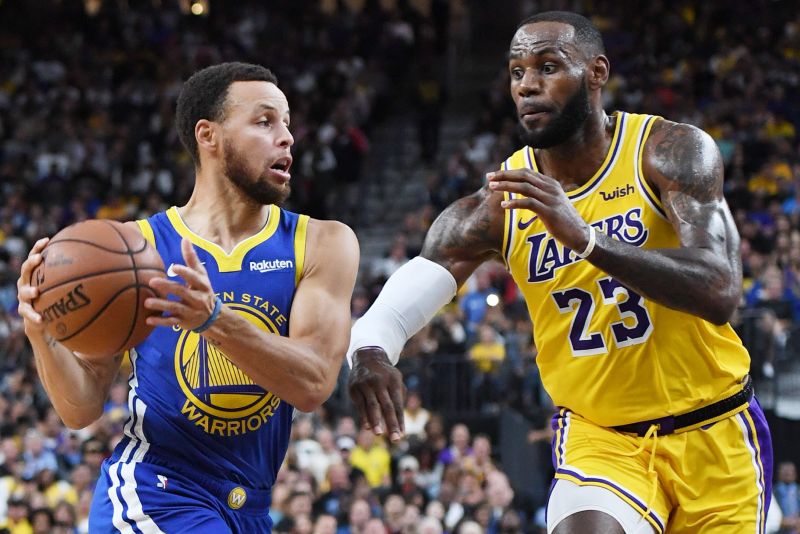 Golden State Warriors' Stephen Curry and LA Lakers' LeBron James