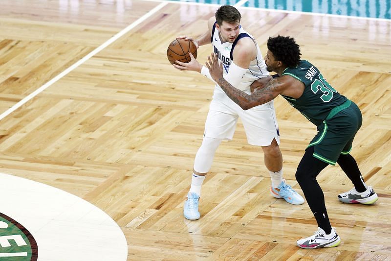 Marcus Smart #36 of the Boston Celtics defends Luka Doncic #77 of the Dallas Mavericks