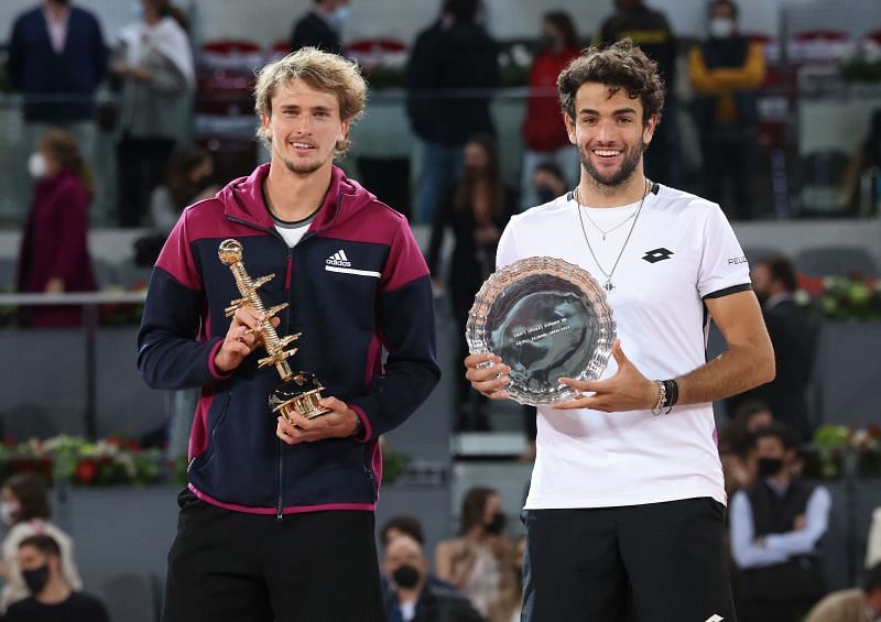 Alexander Zverev and Matteo Berrettini pose during the trophy ceremony in Madrid