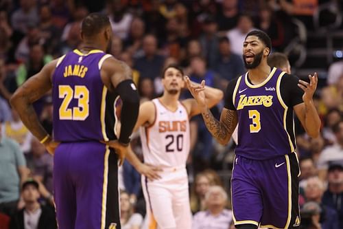 LA Lakers duo Anthony Davis #3 and LeBron James #23 talk during the second half of a game