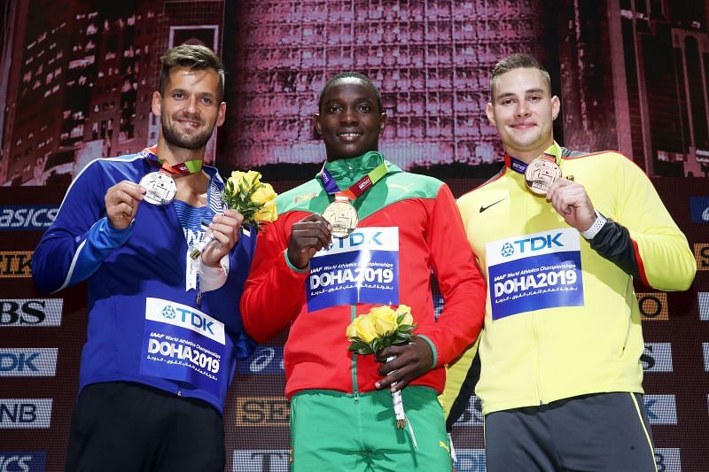 Anderson Peters (centre) won the gold medal at the 2019 World Athletics Championships in Doha