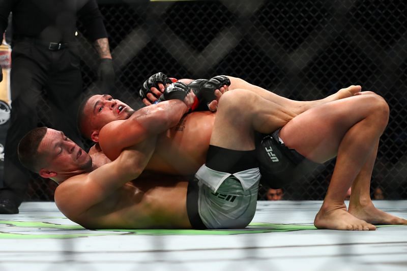 Nate Diaz takes Anthony Pettis' back