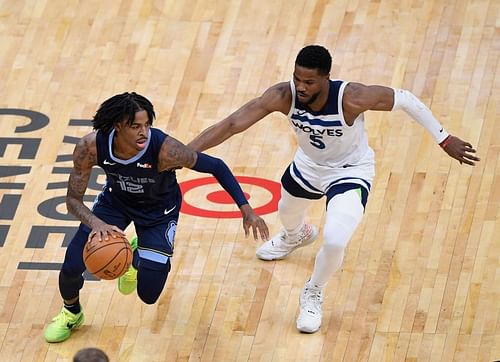 Malik Beasley (#5) against Ja Morant