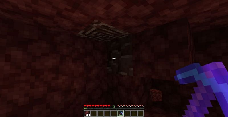 Efficiency V is best for finding ancient debris through strip mining (Image via Minecraft)