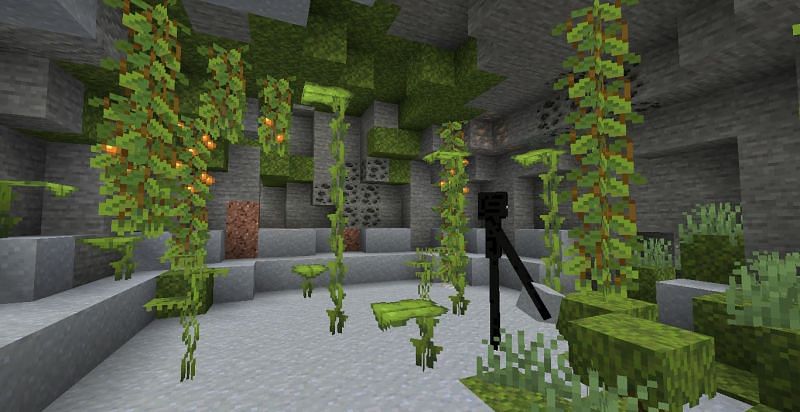 Enderman in a lush cave (Image via Minecraft)