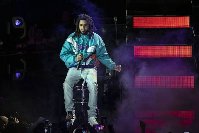 Rapper J. Cole becomes first artist to be featured on the cover of SLAM Magazine after signing professional basketball contract
