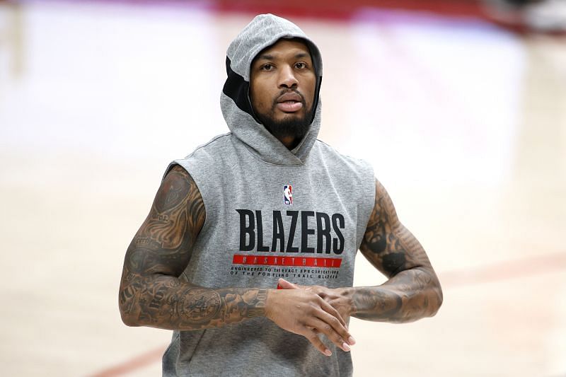 Damian Lillard warms up before a game