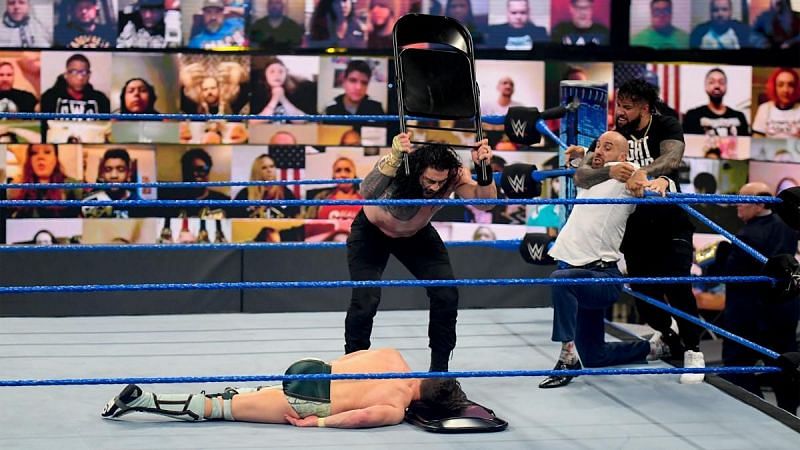 Roman Reigns assaulting Daniel Bryan to prove a point