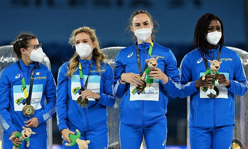 The Italian women&#039;s 4x100m side with their World Athletics Relays gold at the Merchant logo Slaski Stadium