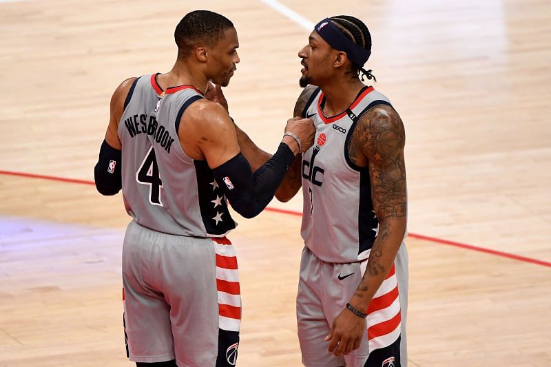 Russell Westbrook #4 and Bradley Beal #3 celebrate after defeating the Charlotte Hornets