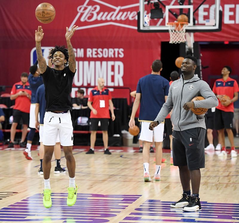 Ja Morant (L) of the Memphis Grizzlies and Zion Williamson #1 of the New Orleans Pelicans.