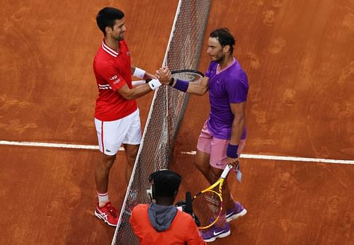 Novak Djokovic congratulates Rafael Nadal after the latter's Italian Open win