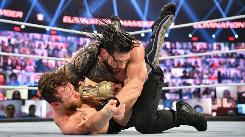 Roman Reigns assaulting Daniel Bryan