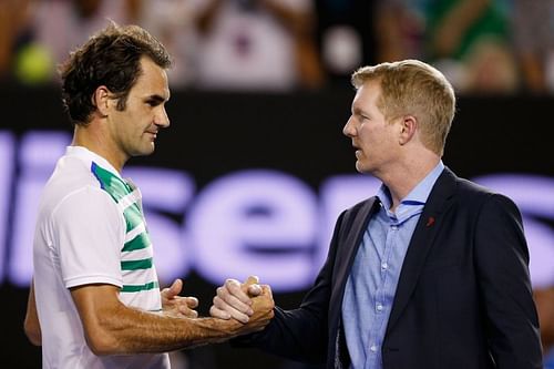 Roger Federer and Jim Courier (R)