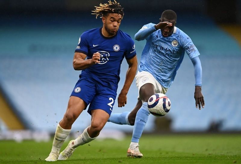 Benjamin Mendy (right) was outpaced by James on the night.