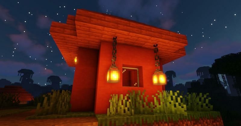 A Village house improved with some lanterns in Minecraft (Image via Minecraft)