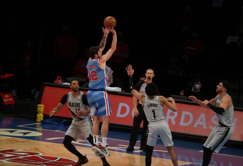 Joe Harris #12 of the Brooklyn Nets shoots