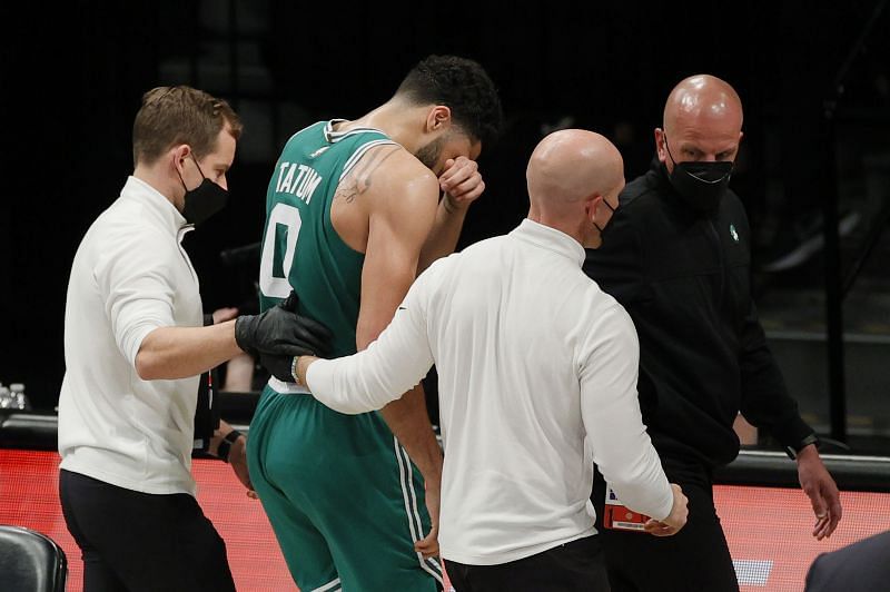 Jayson Tatum #0 of the Boston Celtics leaves the court after an injury during the second half of Game Two of their Eastern Conference first-round playoff series