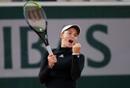 Jelena Ostapenko celebrates after beating Karolina Pliskova at Roland Garros 2020