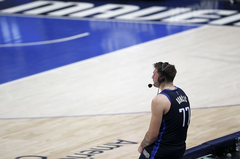 Luka Doncic of the Dallas Mavericks talks to the press postgame