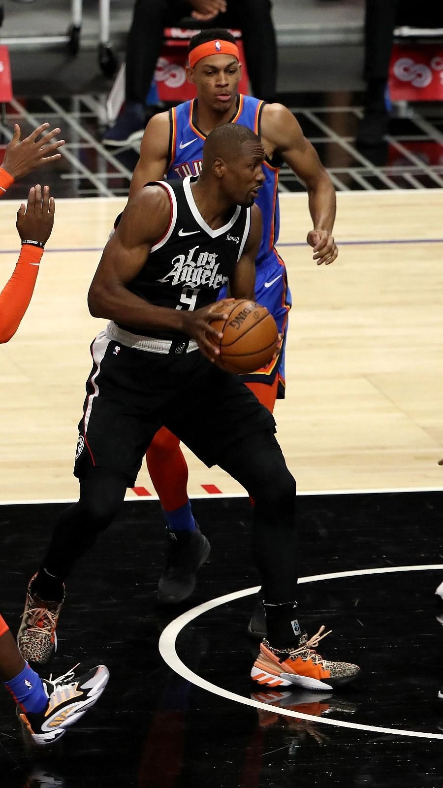 Paul George of the LA Clippers handles the ball against the Dallas