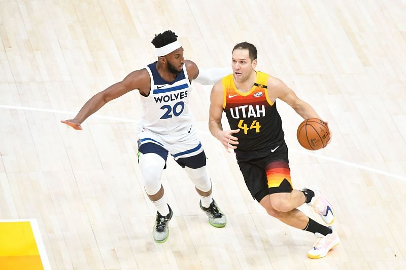 Bojan Bogdanovic #44 of the Utah Jazz drives against Josh Okogie #20 of the Minnesota Timberwolves.