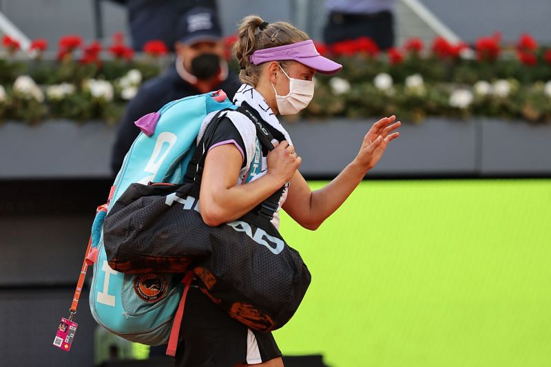 Elise Mertens leaves the court after retiring from her match against Aryna Sabalenka at Madrid