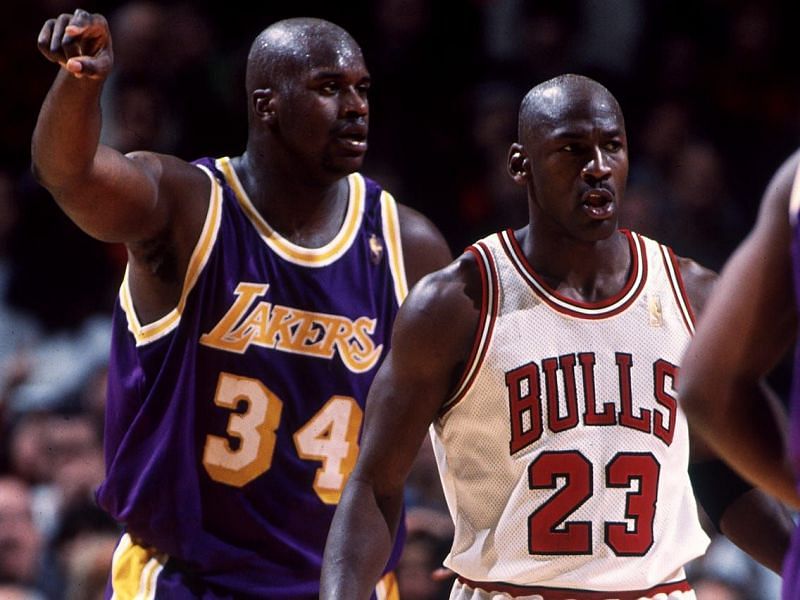 Shaquille O&#039;Neal of the LA Lakers and Michael Jordan of the Chicago Bulls