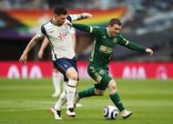 John Fleck might've been red-carded for a stamp on Giovani Lo Celso but got away with it.