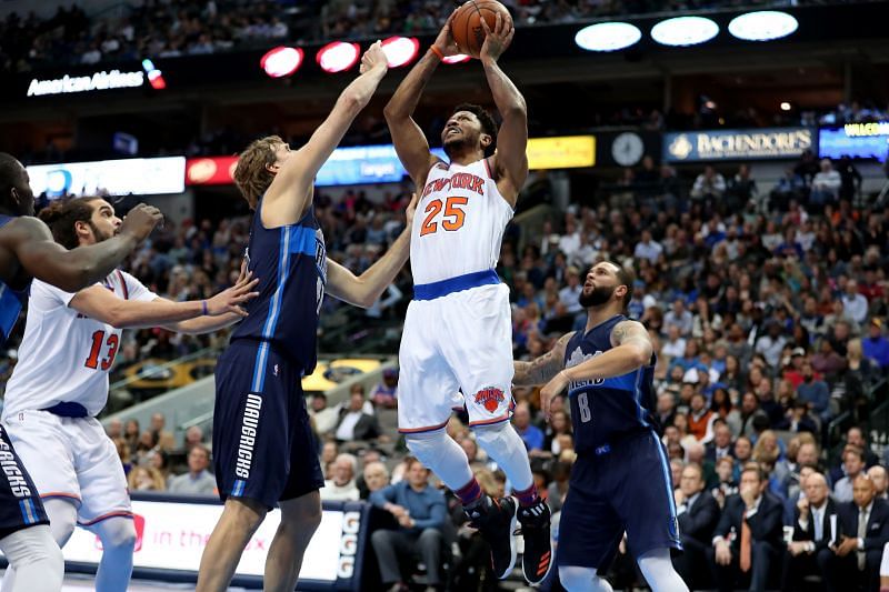 Derrick Rose (#25) of the New York Knicks shoots the ball against Dirk Nowitzki (#41) of the Dallas Mavericks