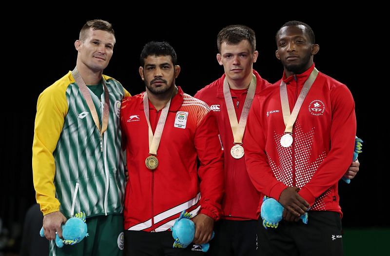 Sushil Kumar (2nd from right) with fellow wrestlers at the Commonwealth Games