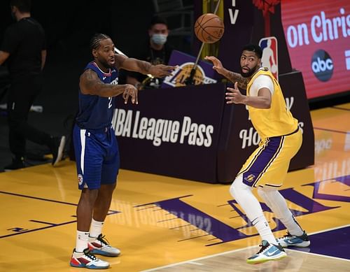 Kawhi Leonard #2 inbounds in front of Anthony Davis #3.