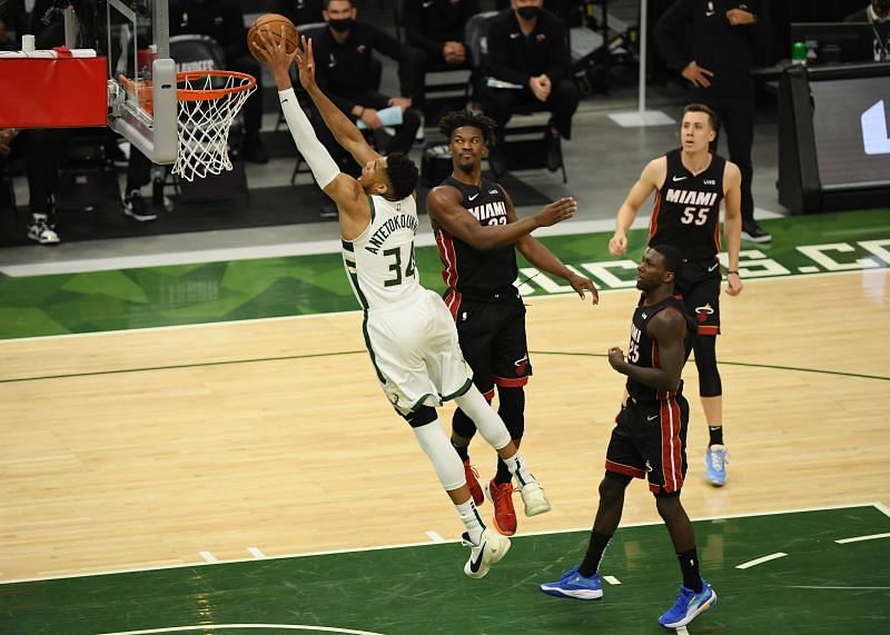 Giannis Antetokounmpo of the Milwaukee Bucks finishes at the rim against the Miami Heat