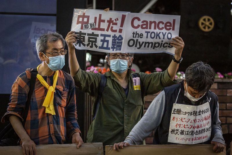 Protesters rally against the Tokyo Olympic in the city on Monday