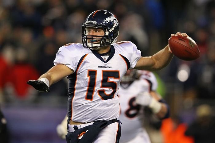 Quarterback Tim Tebow (15) celebrates a score during an NFL game against  the New England Patriots – Denver Broncos History