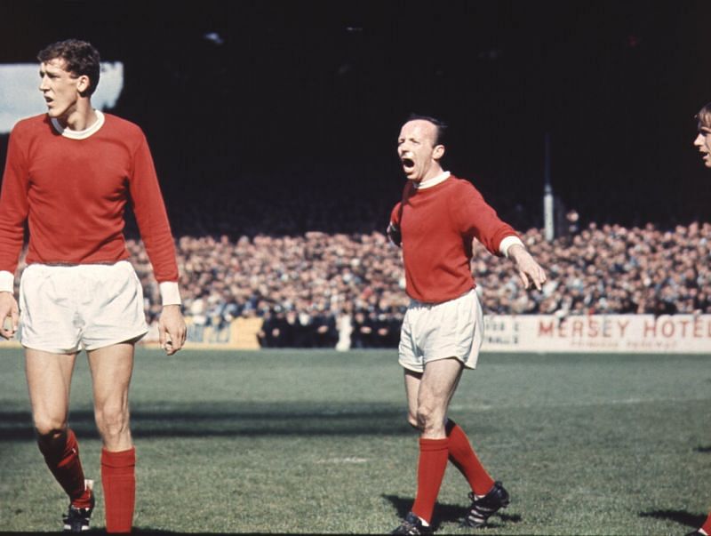 Nobby Stiles shouts instructions to his fellow manchester united team mates